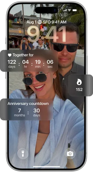 Floom widgets on an iPhone lock screen: days together and anniversary countdown