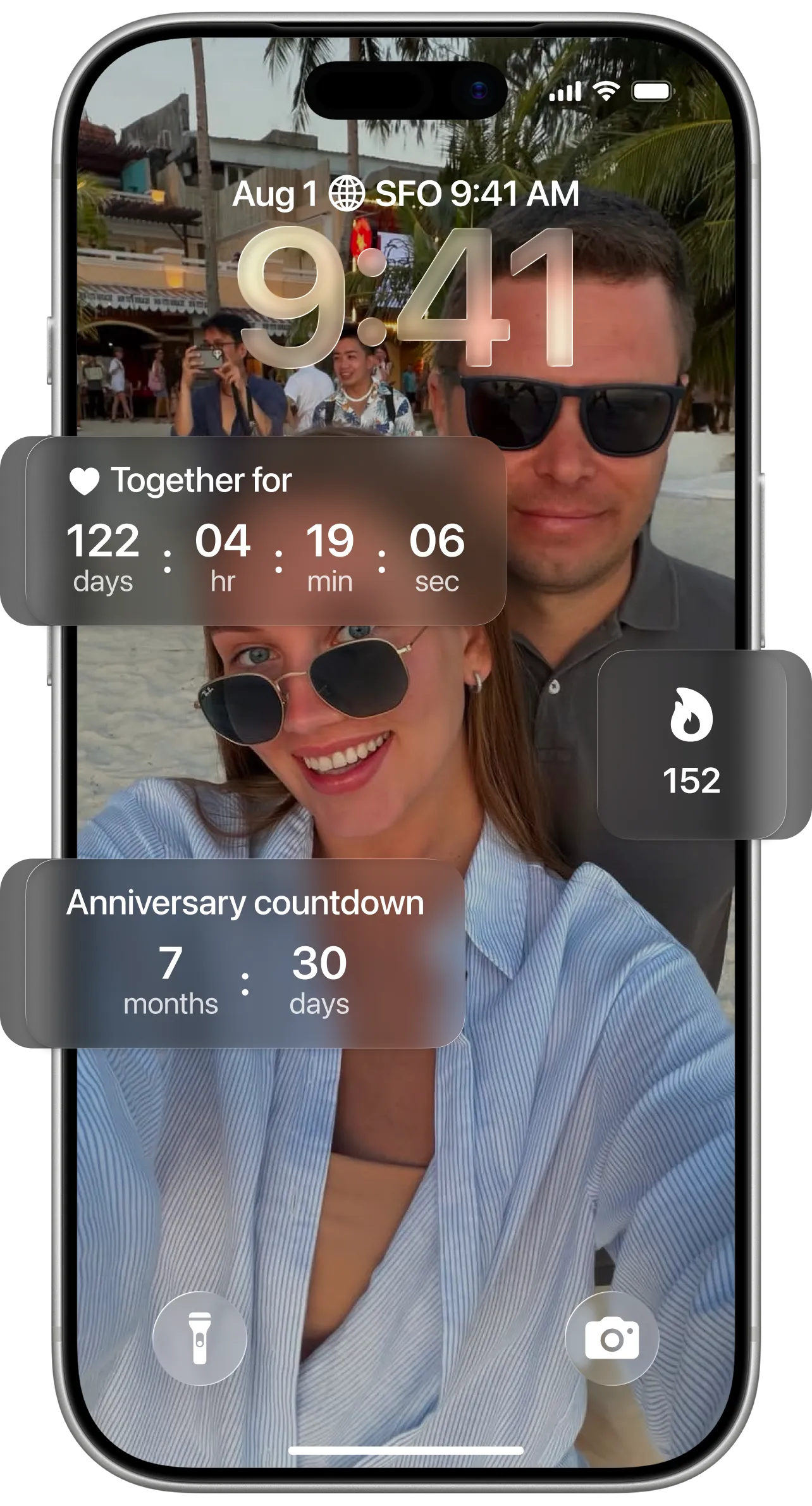 Floom widgets on an iPhone Lock Screen: days together and an anniversary countdown
